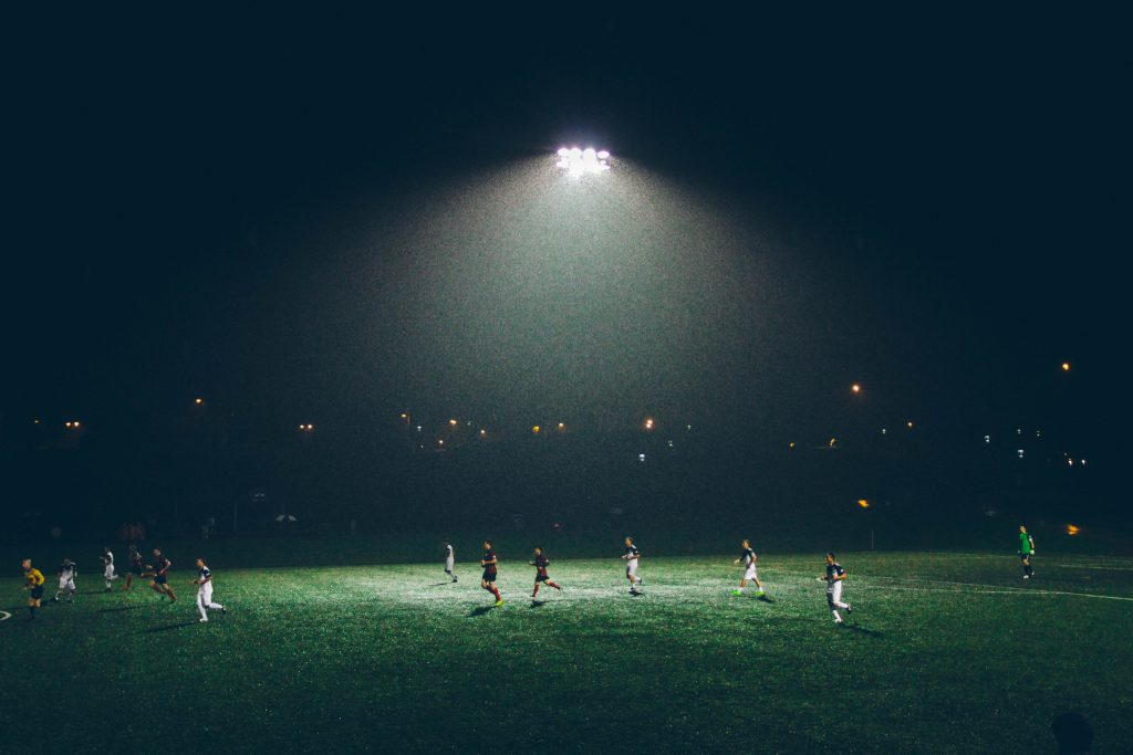 Soccer game being played at night